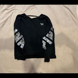 PINK Black sequin long sleeve top, with a dip in the back